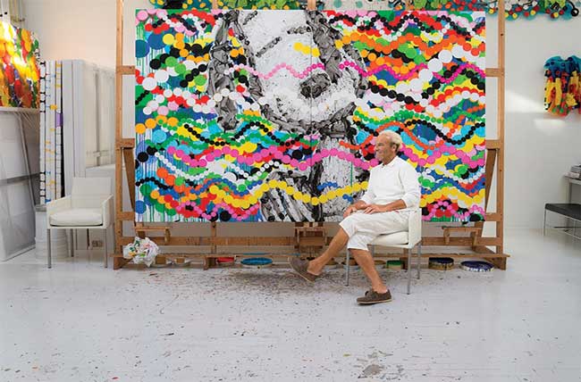 Tom Everhart in studio in front of Big Poppa painting
